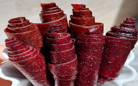 تصویر 1 از خرید لواشک خرما ترش + قیمت فروش استثنایی